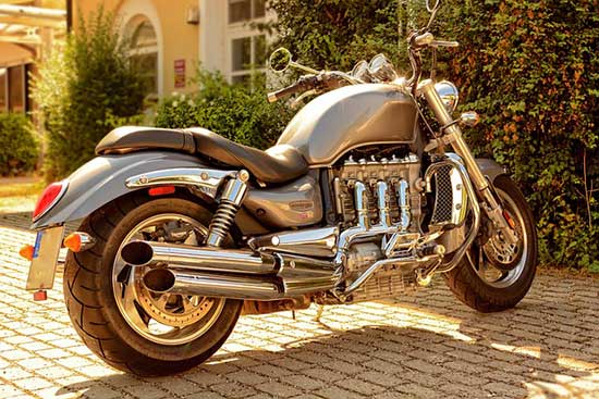 Who makes Triumph motorcycle engines?
